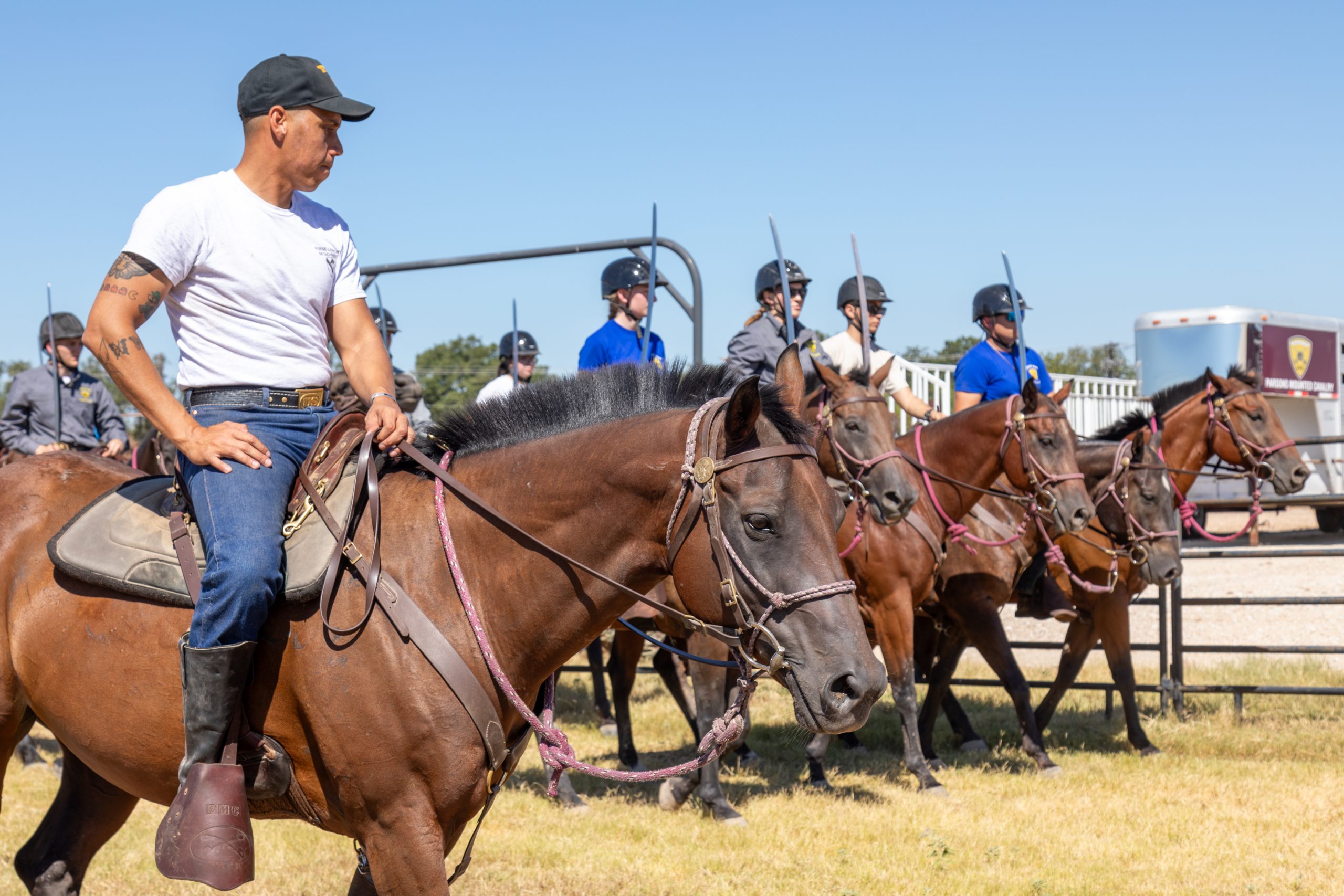 Soldier from U.S. Army's 1st Cavalry Division rides with PMC cadets
