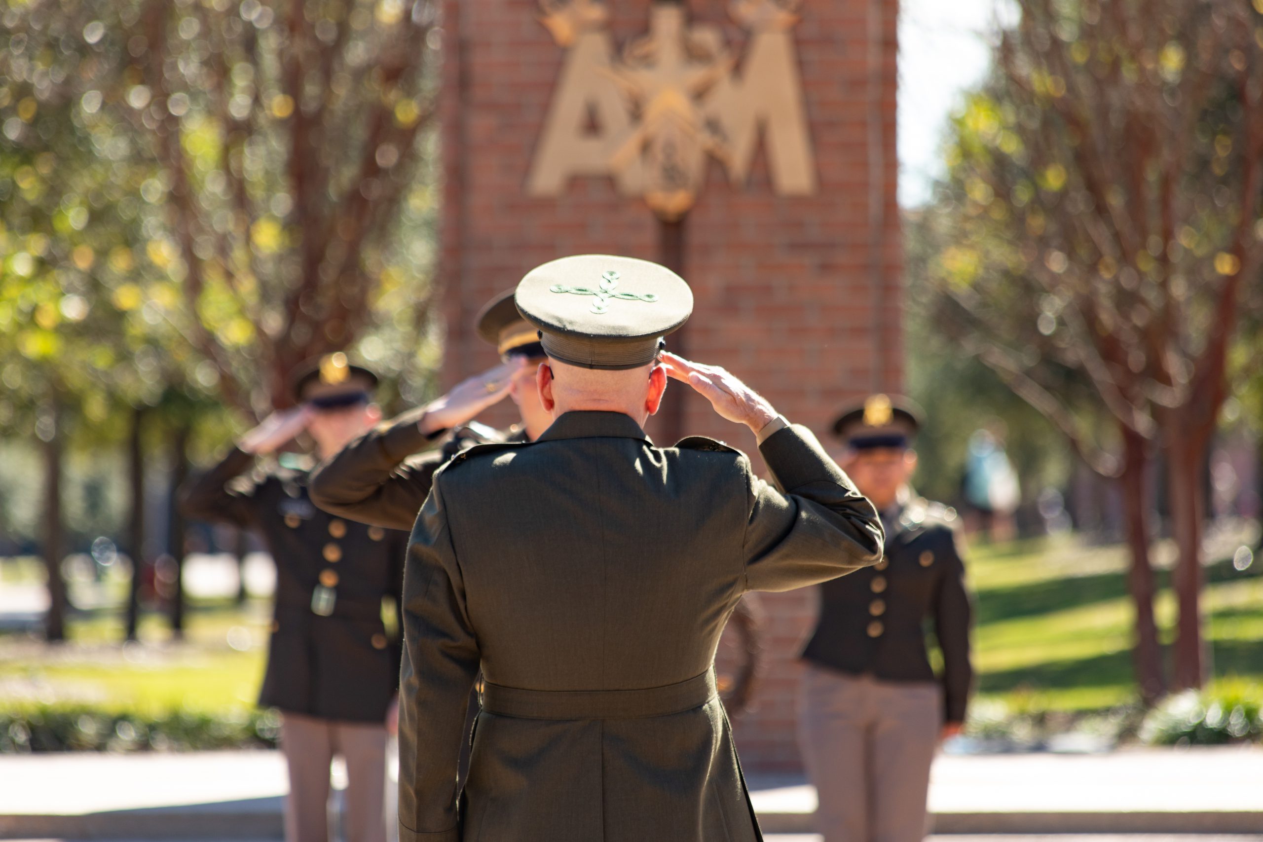 Colonel Stebbins salutes cadets at Veterans Day ceremony on the Quad