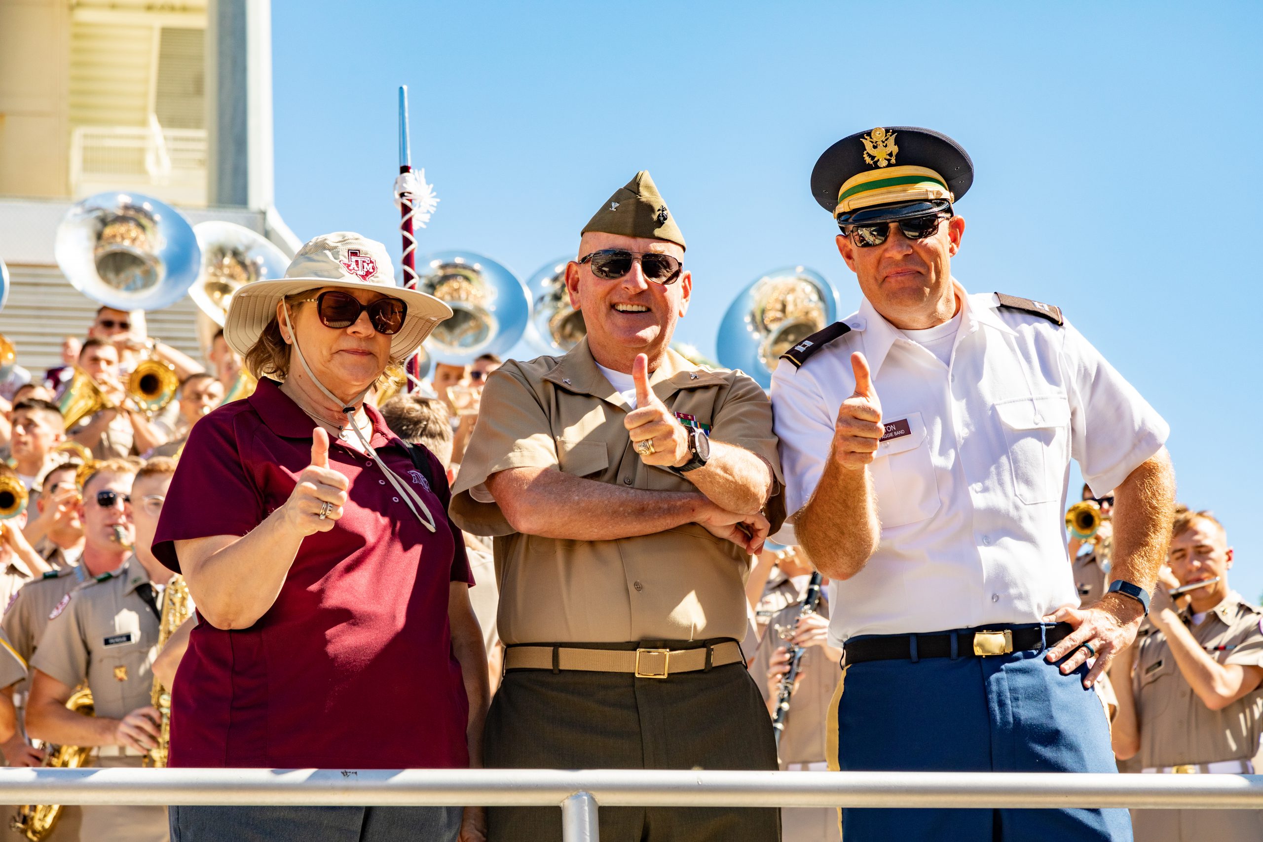 Colonel Stebbins smiles with Colonel Tipton and his wife, Ann