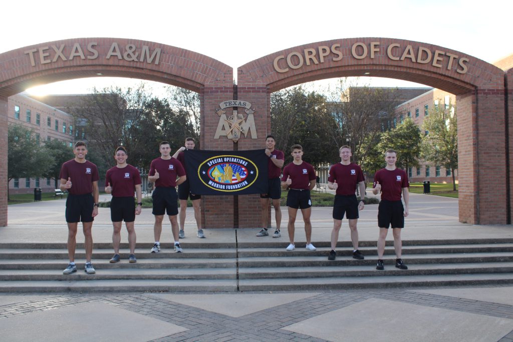 Members of the Project Atlas team stand in front of the Corps of Cadets arches. 