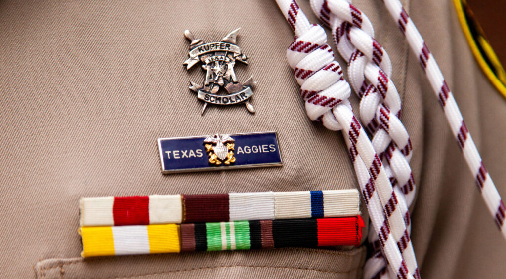 Image of the Kupfer pin on a cadet's uniform.