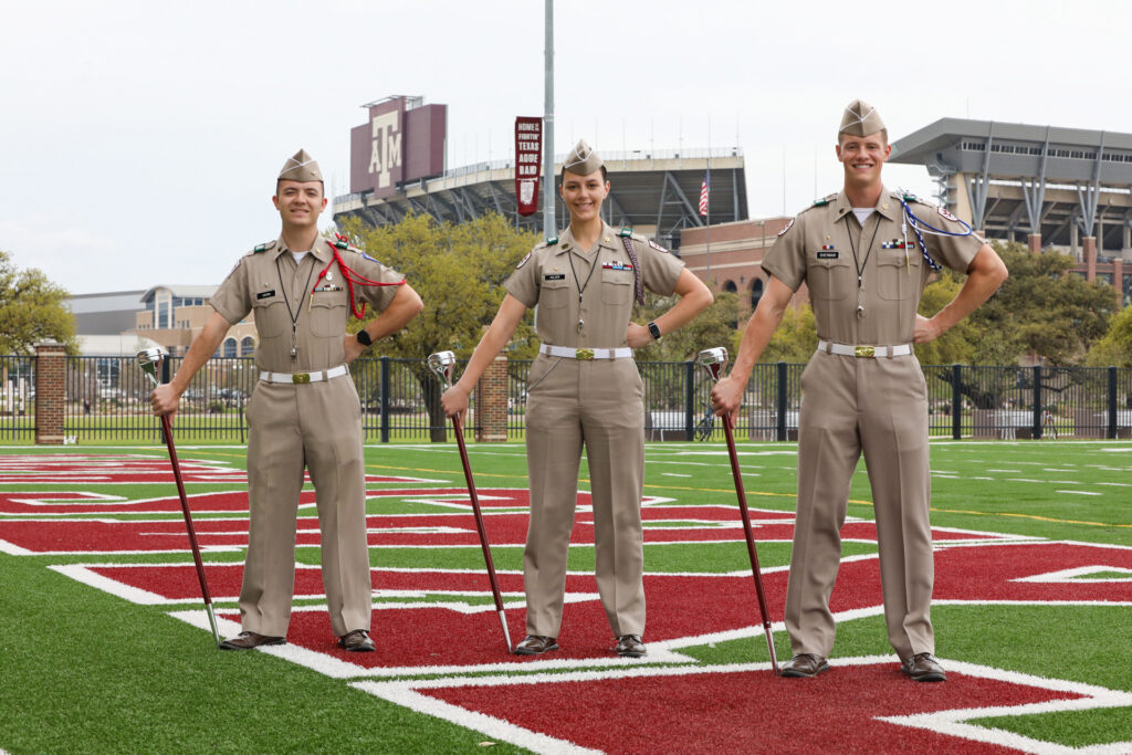 2025-2026 FTAB Drum Majors stand in front of Kyle Field