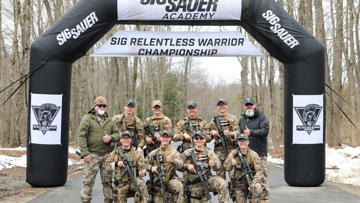 Cadets under the Sig Sauer arch