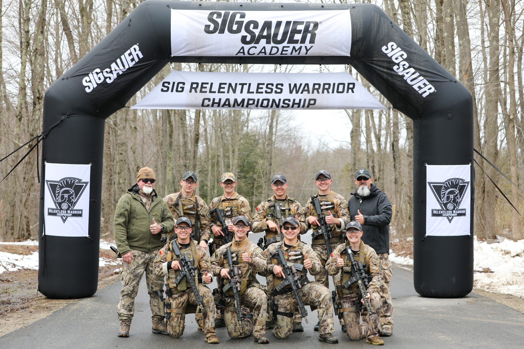 Cadets under the Sig Sauer arch