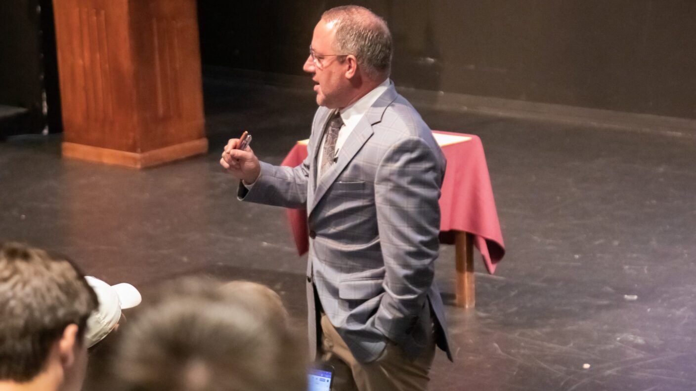 A man giving a lecture.