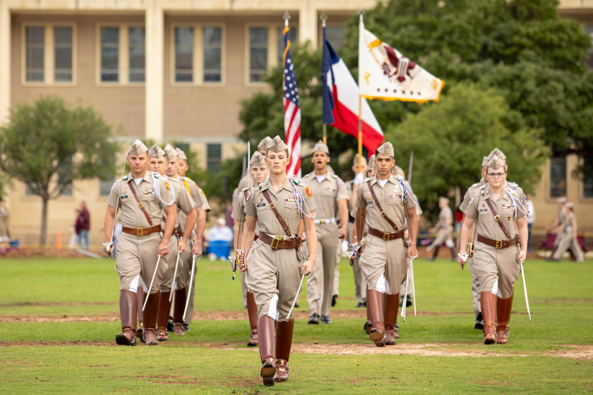 Cadets marching on a field.